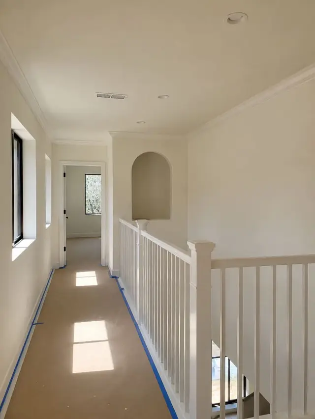 Detail masking and surface protection during interior paint project Los Angeles