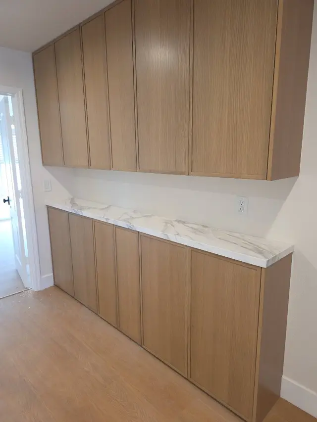 Built-in cabinets with marble countertop interior remodel Los Angeles