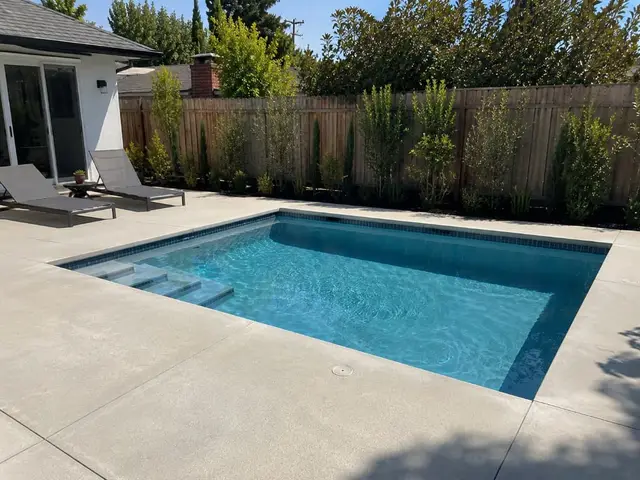 Freeform pool with landscaping Los Angeles