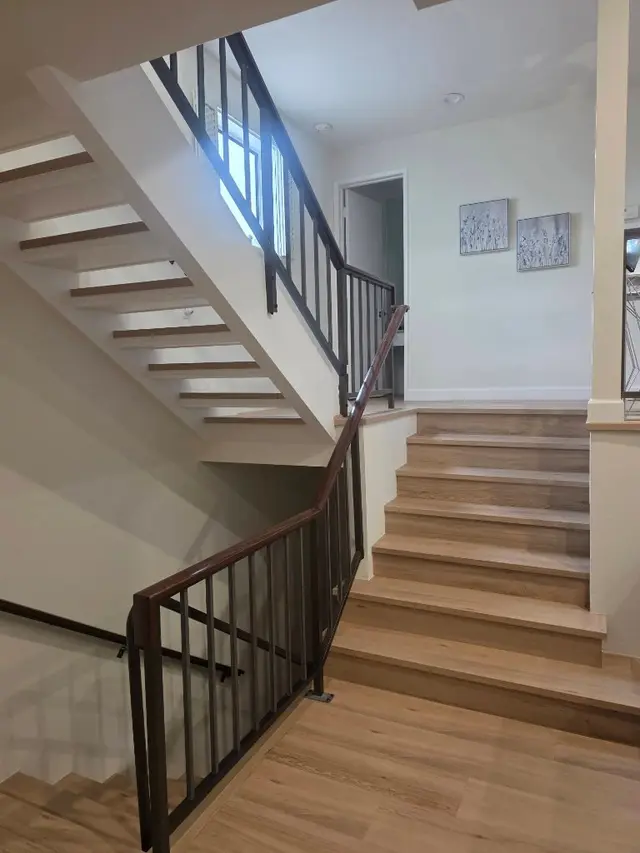 Close-up of finished staircase treads with new flooring California